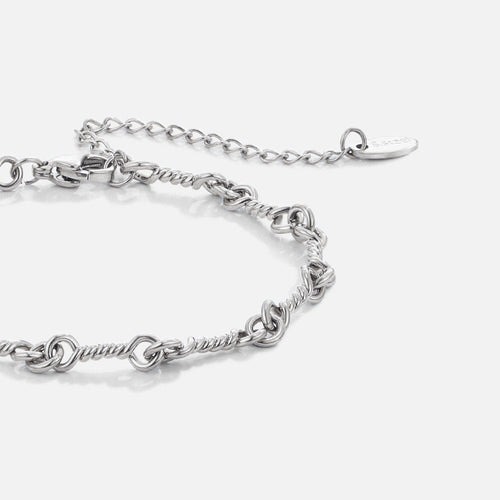 Pulseira em Corrente Figaro com Nó Prateada